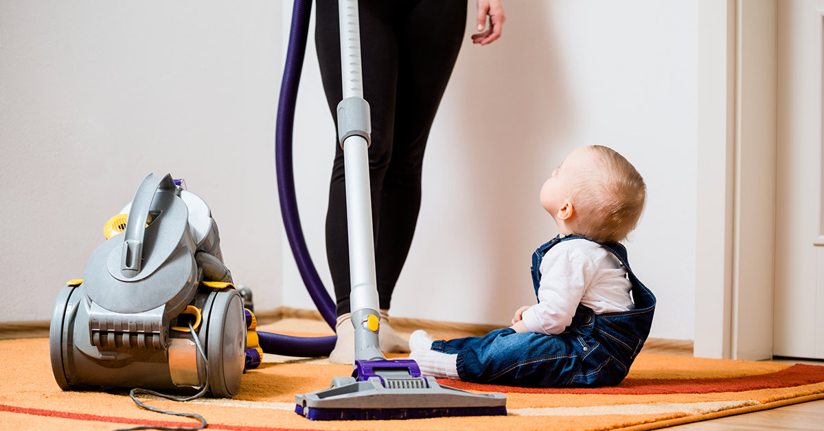 mother vacuuming