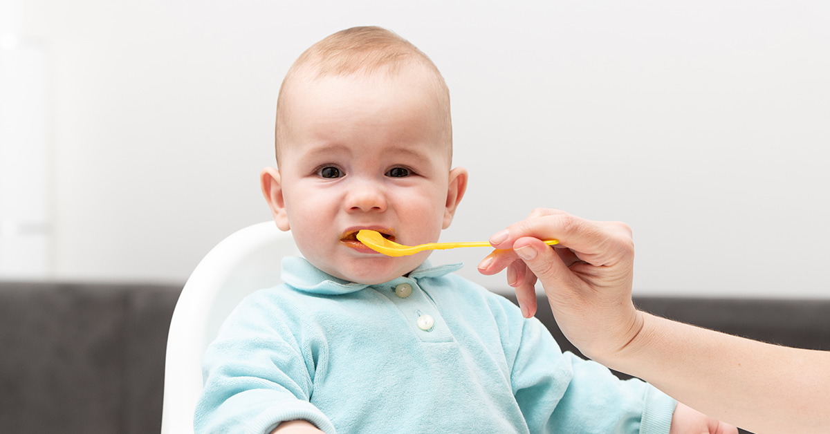 baby eating baby food