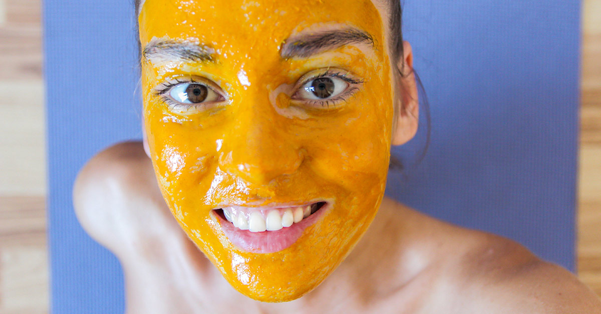 woman with a turmeric facial