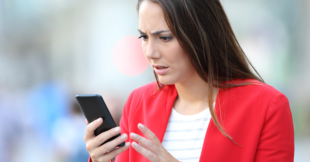 woman looking at phone