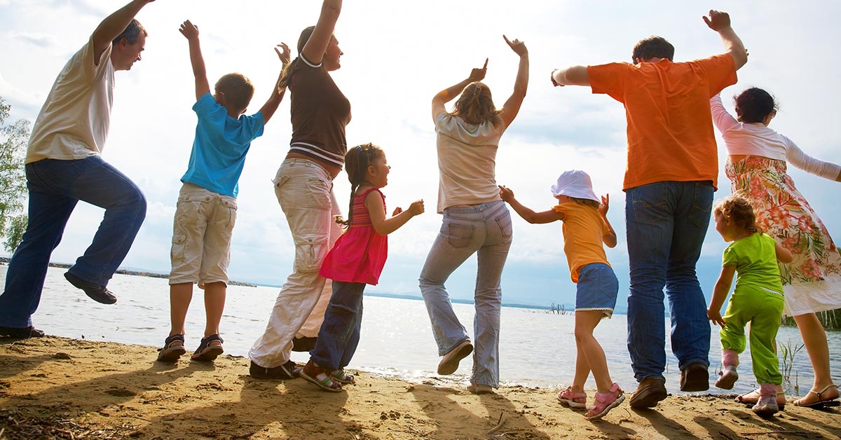 people dancing on beach
