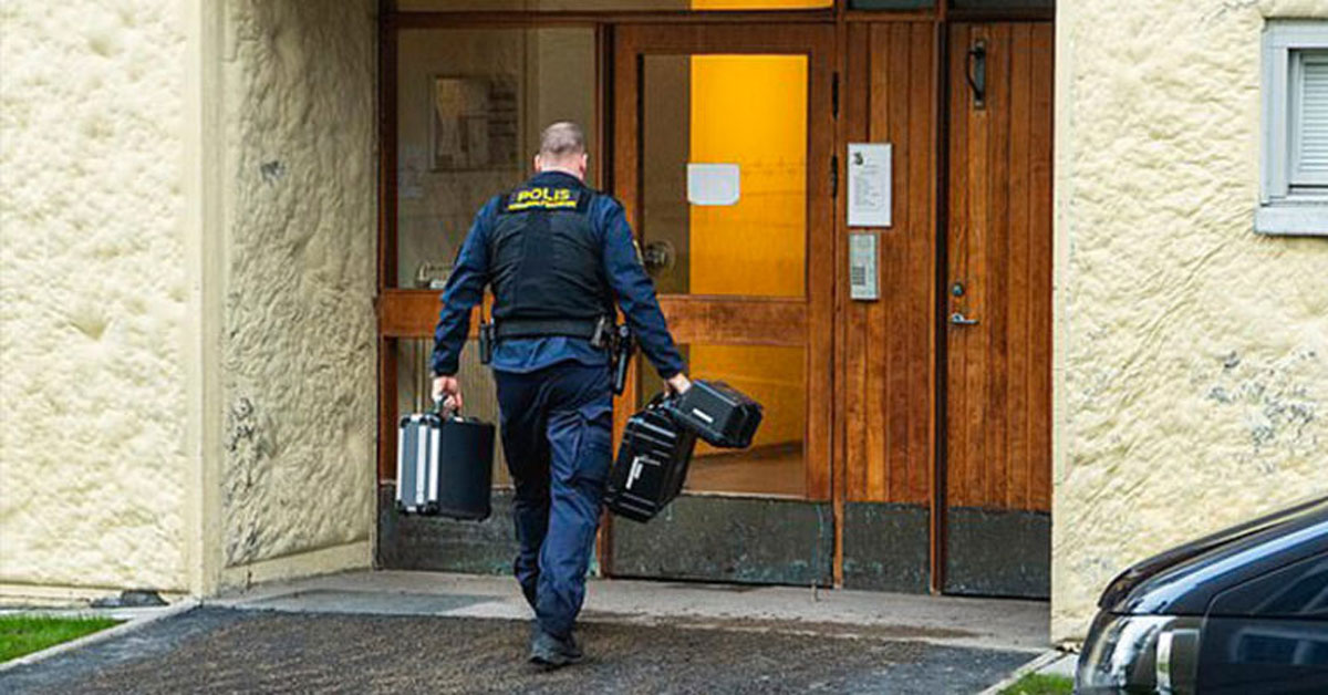 police entering an apartment