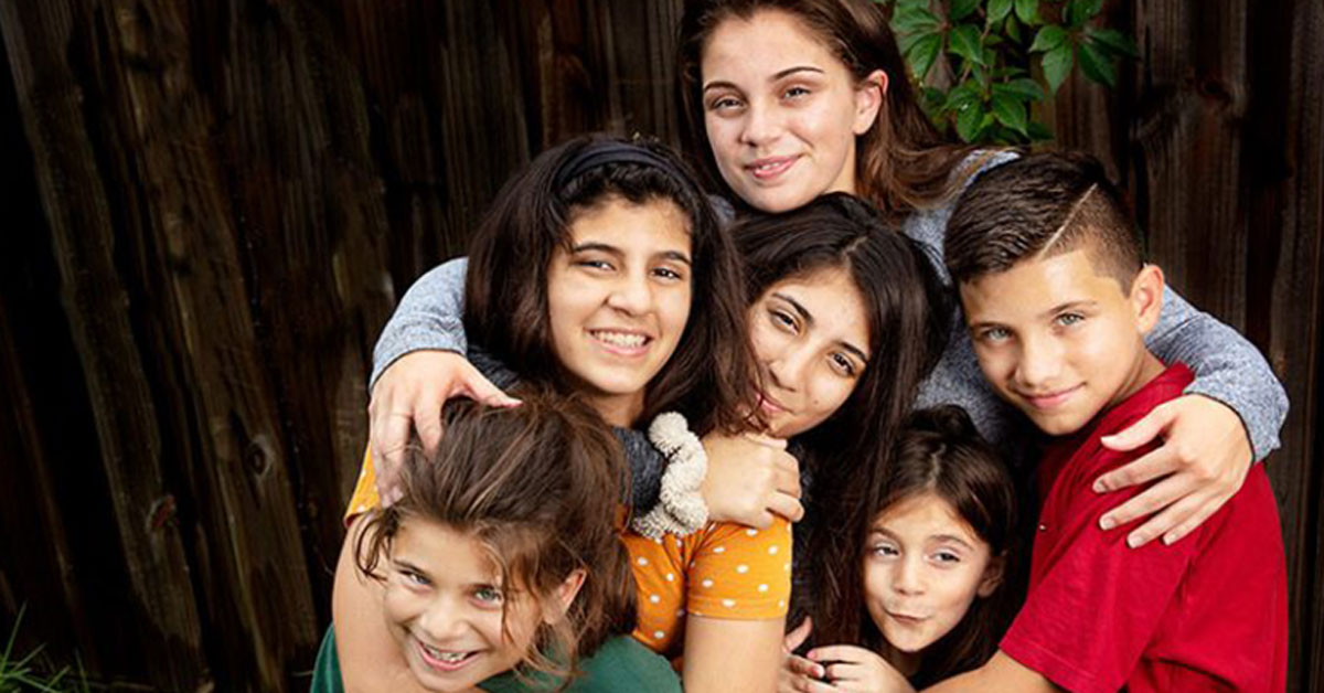 woman raising her 5 siblings