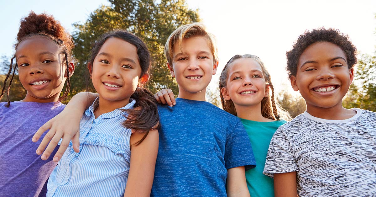 group of 5 children of various genders and ethnicities