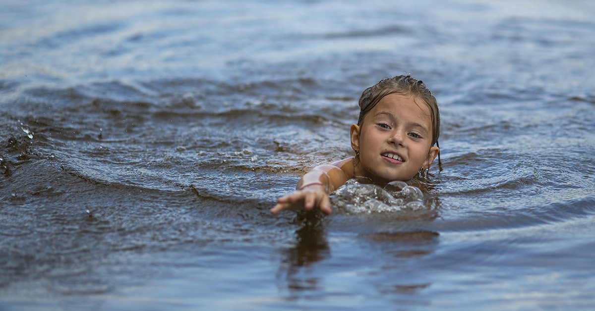 child swimming