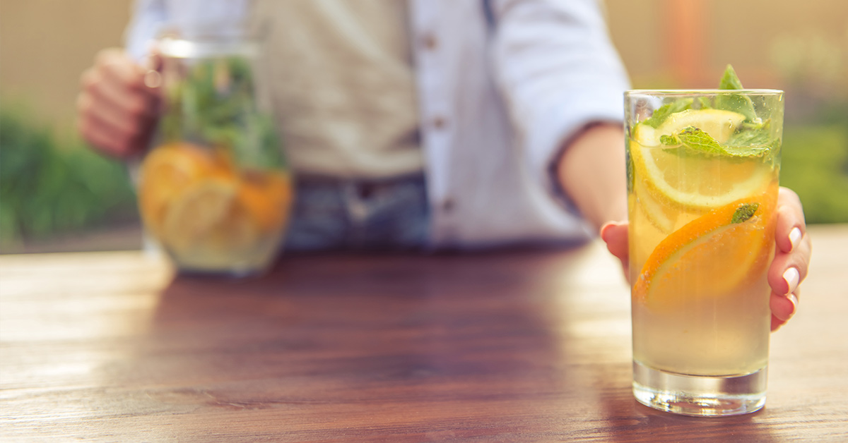 lemonade being served in a glass
