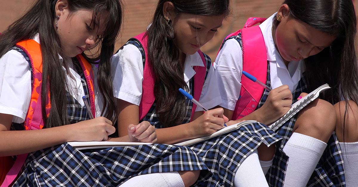 young girls in school uniforms