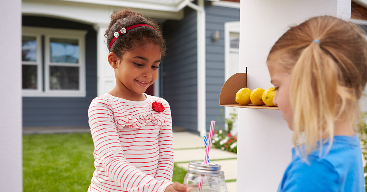 young girl at lemonade stand