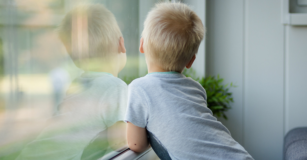 boy by a window
