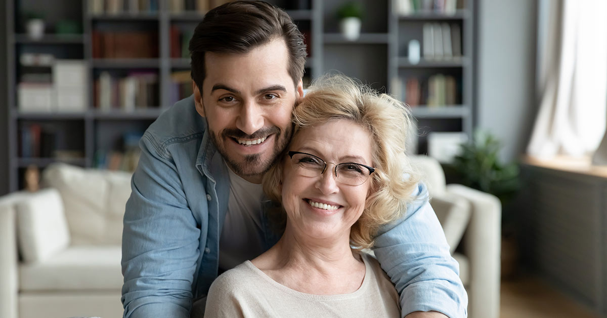 man and woman smiling