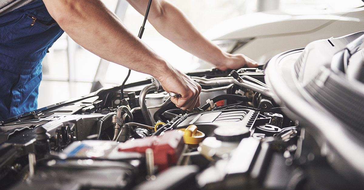 mechanic working on a car