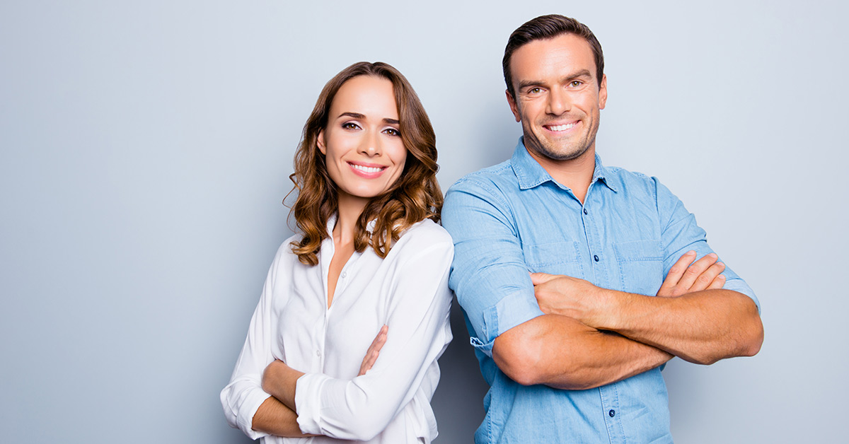 couple with arms crossed