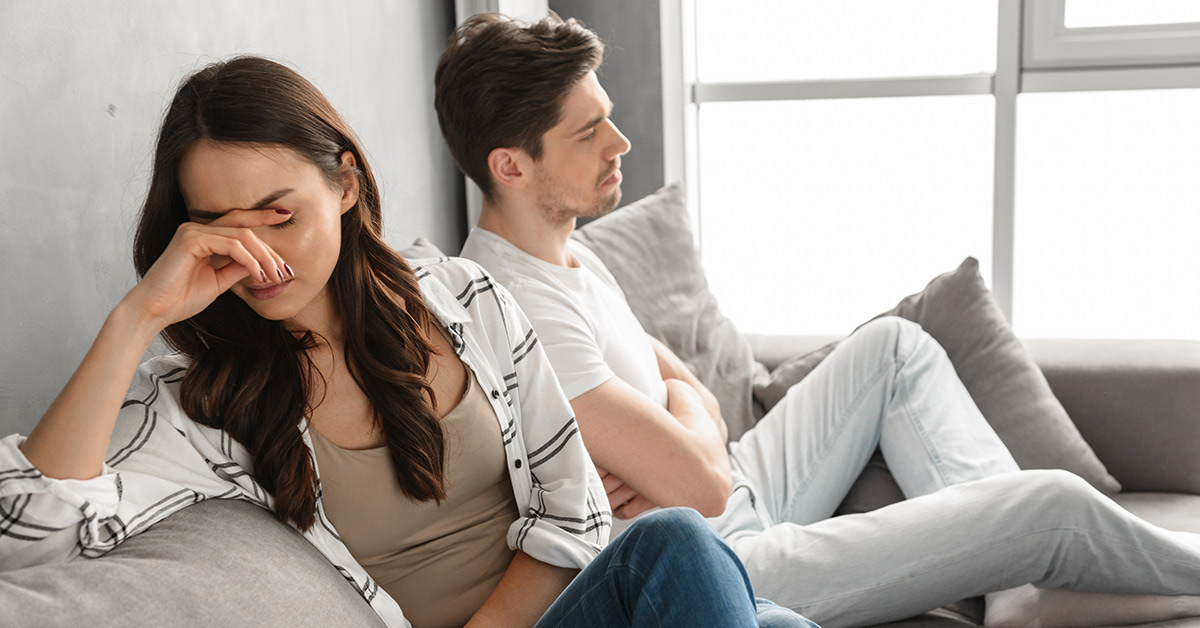 fighting couple on couch