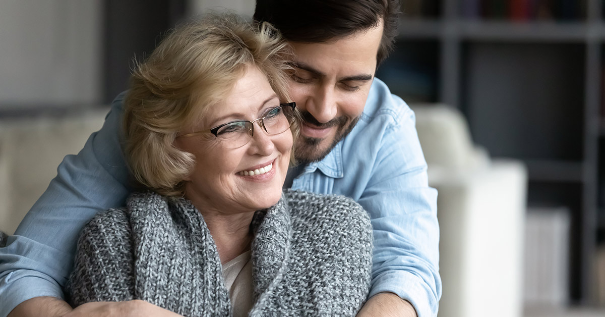 mother and son embracing
