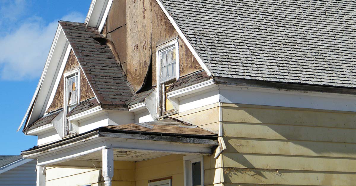 outside of a home in disrepair
