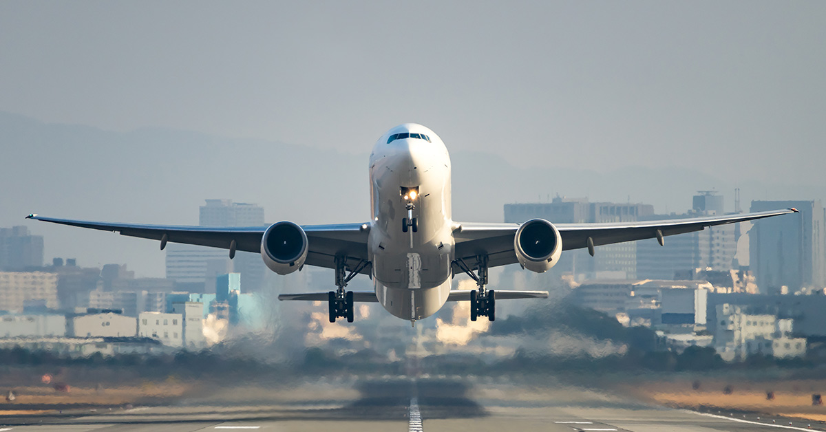 commercial airplane taking off from airport