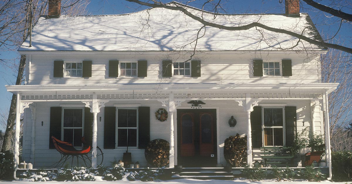 the facade of a white 2 storey family home