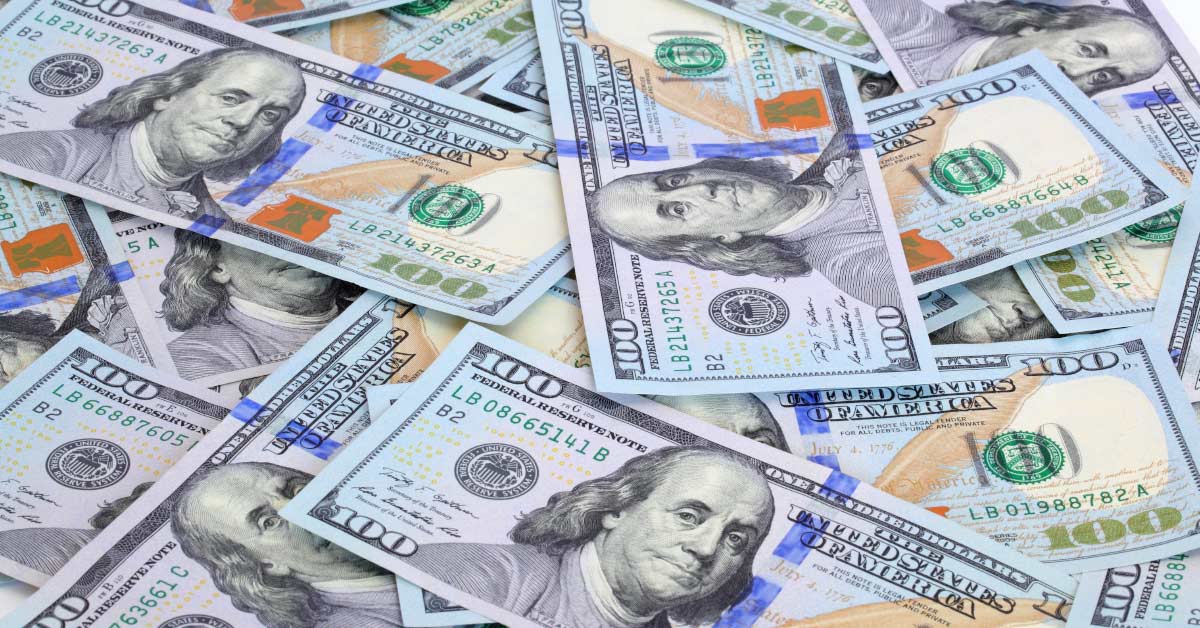 pile of 100 dollar American bills