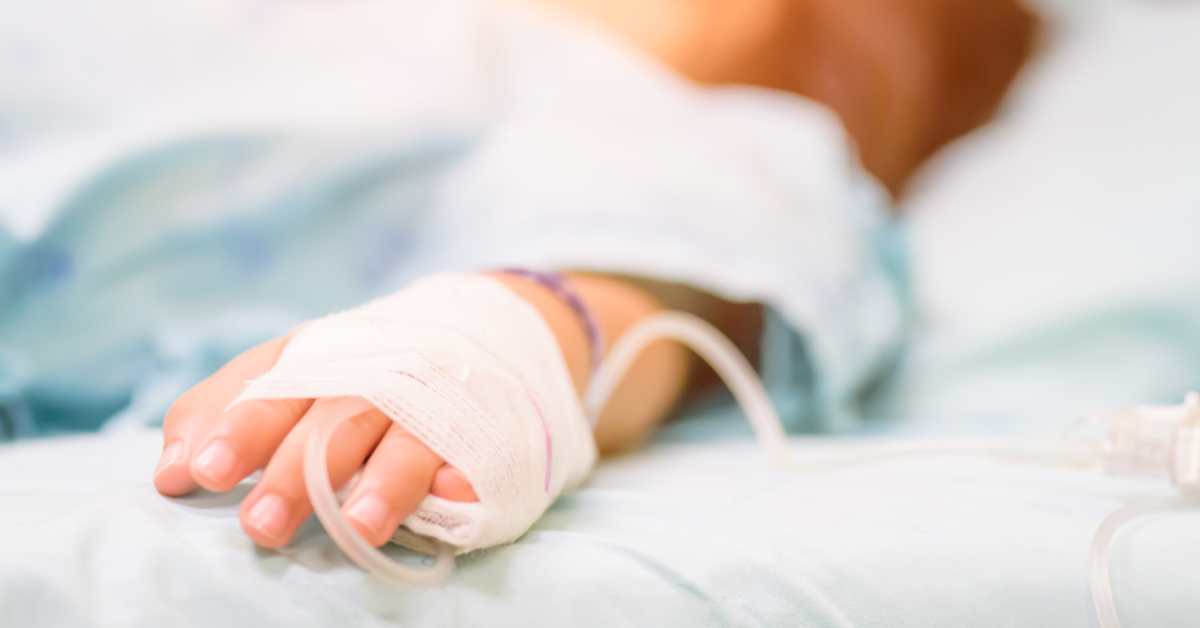 IV in persons hand