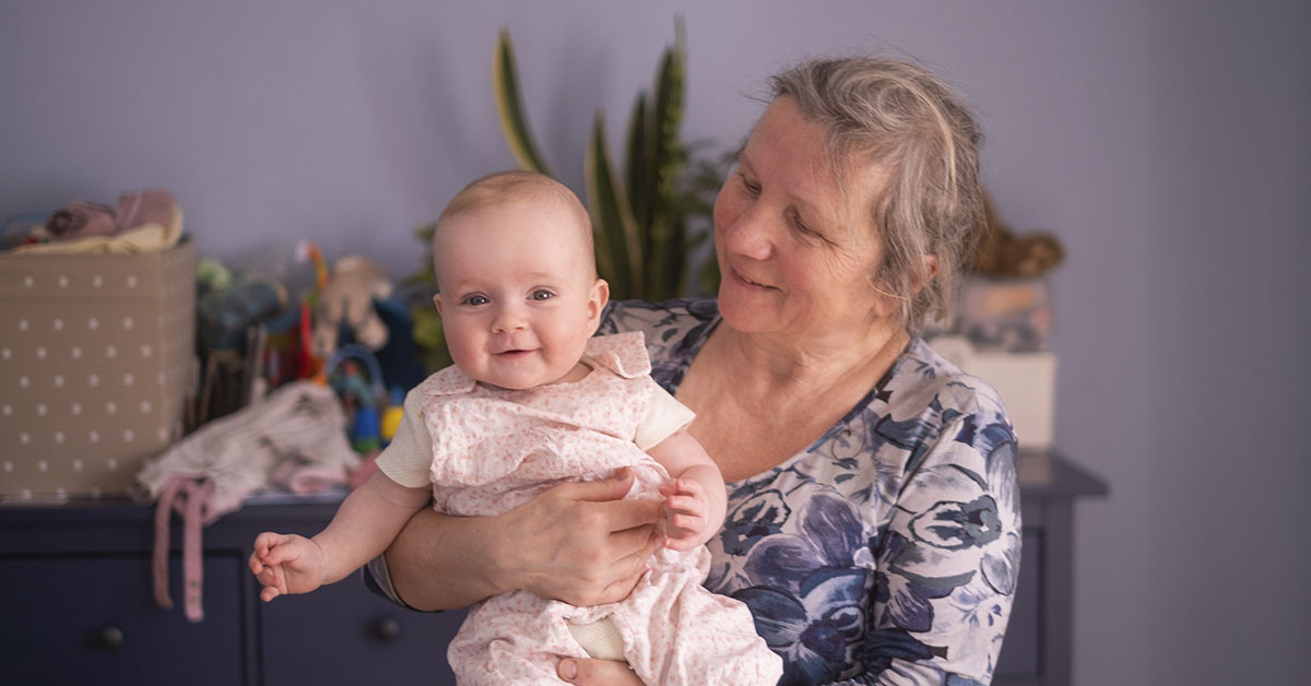 Elderly mother with baby