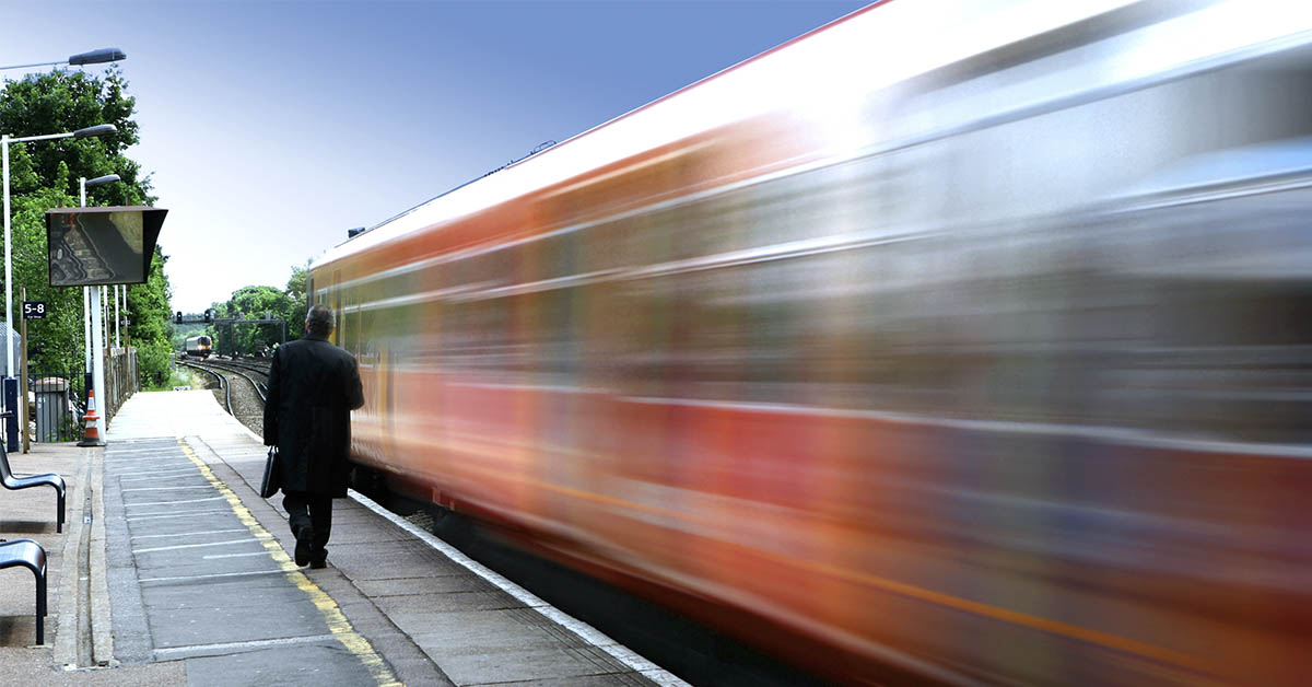 train speeding by pedestrian