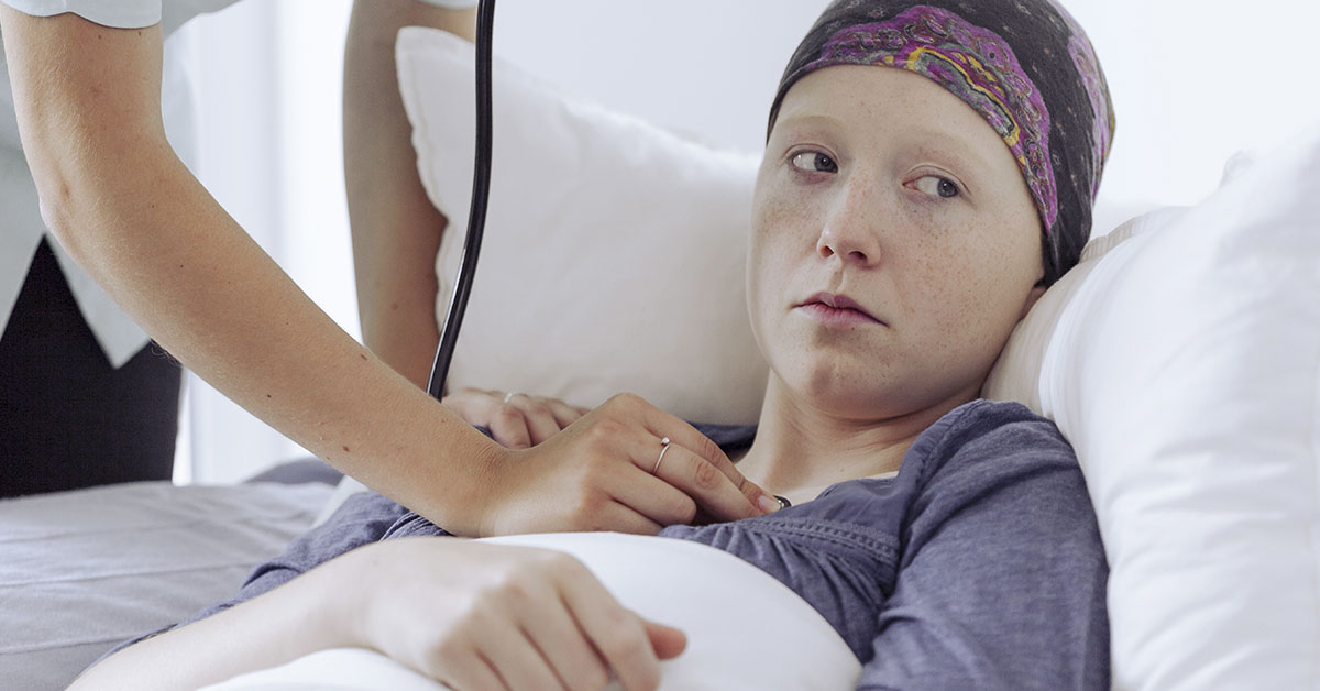 cancer patient in hospital bed