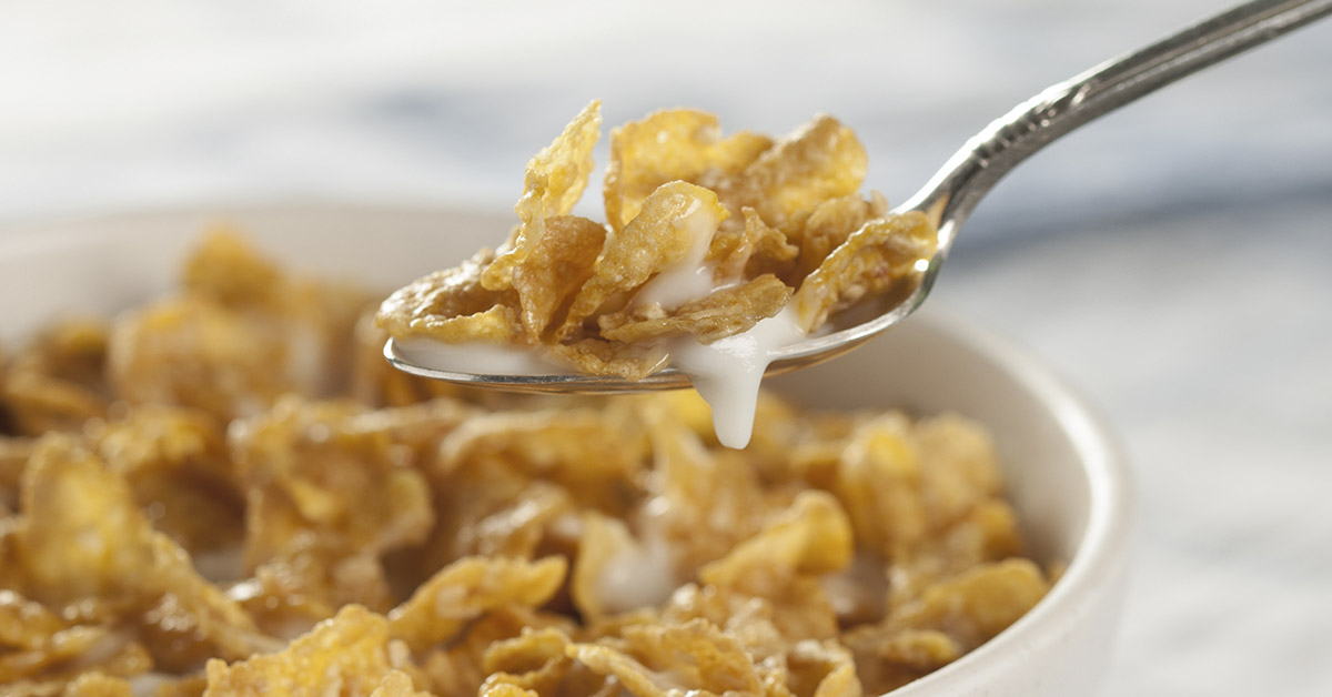 a spoonful of cereal be lifted out of a bowl of cereal