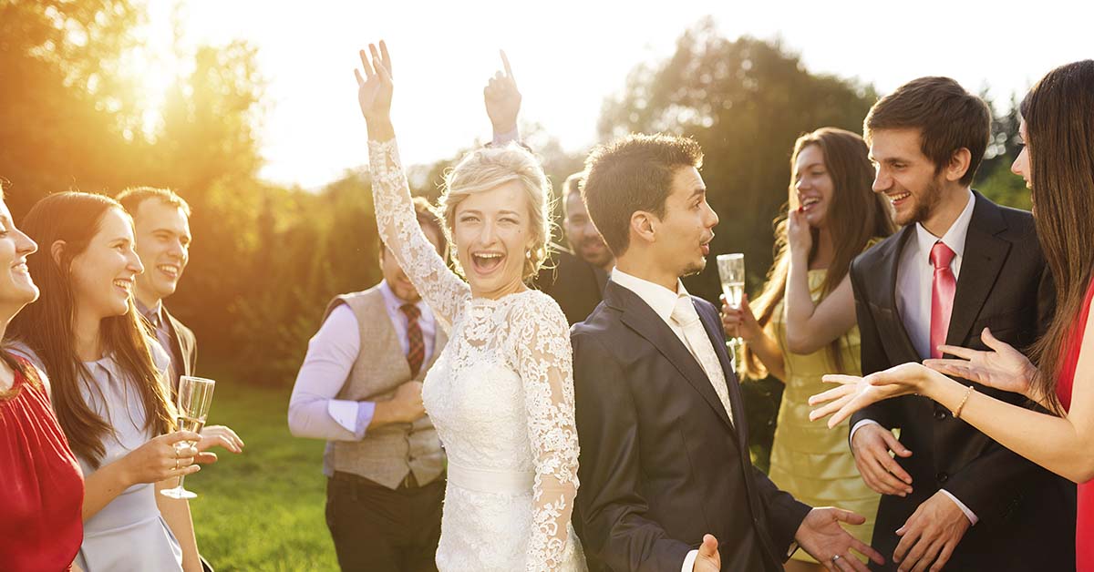 various people at wedding reception outdoors