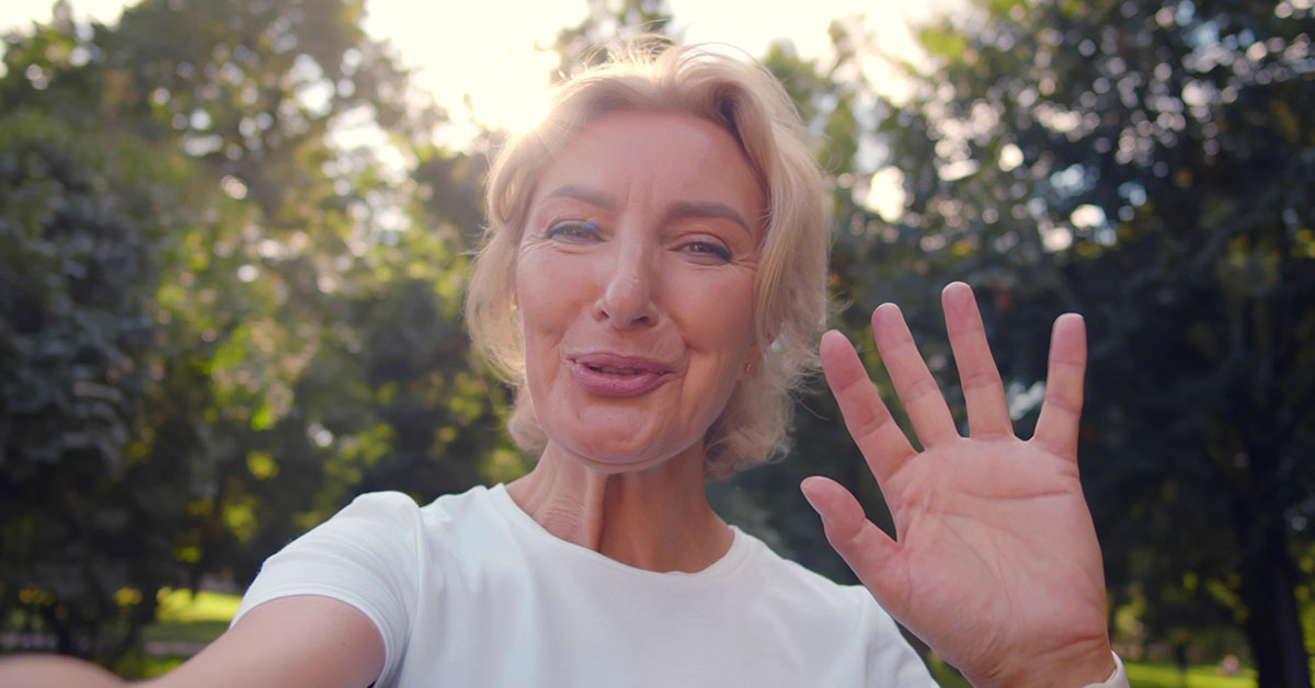 woman waving