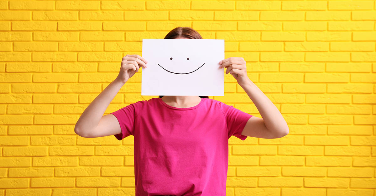 person holding a smile