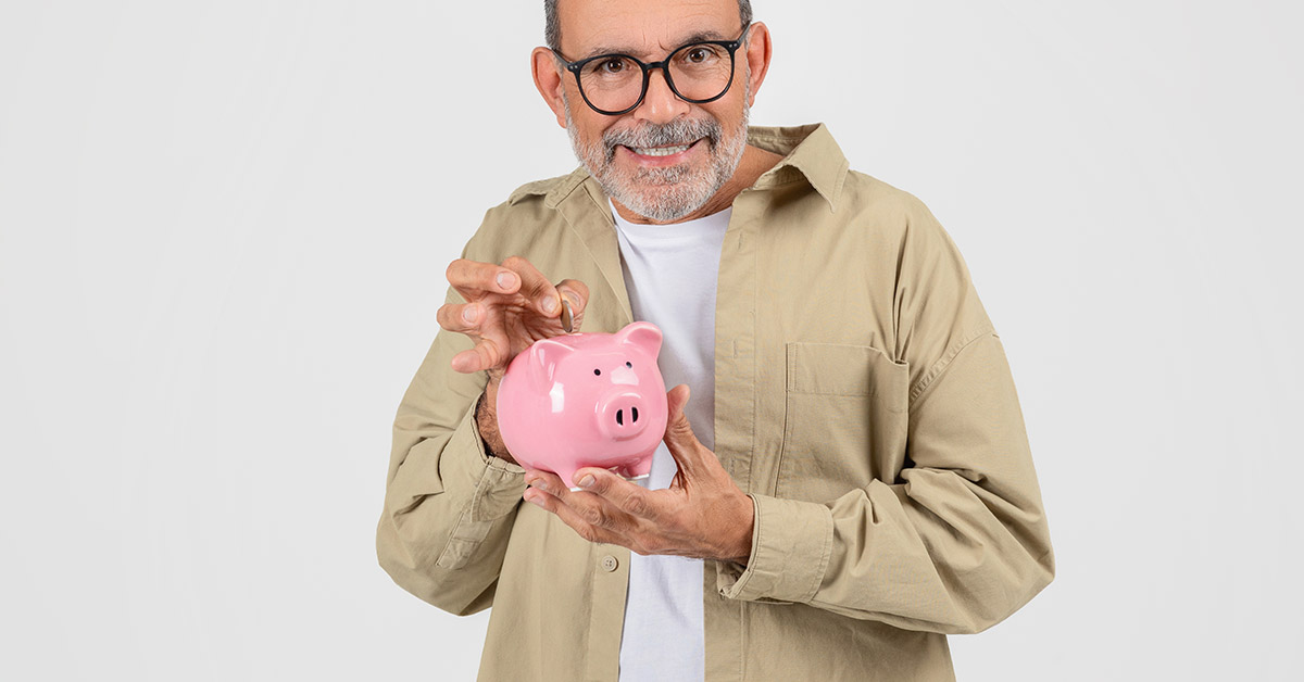man holding piggy bank. Frugal, cheap concept