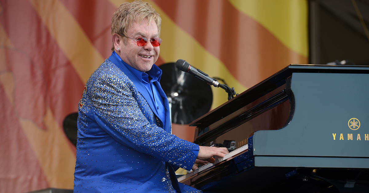 Elton John playing piano