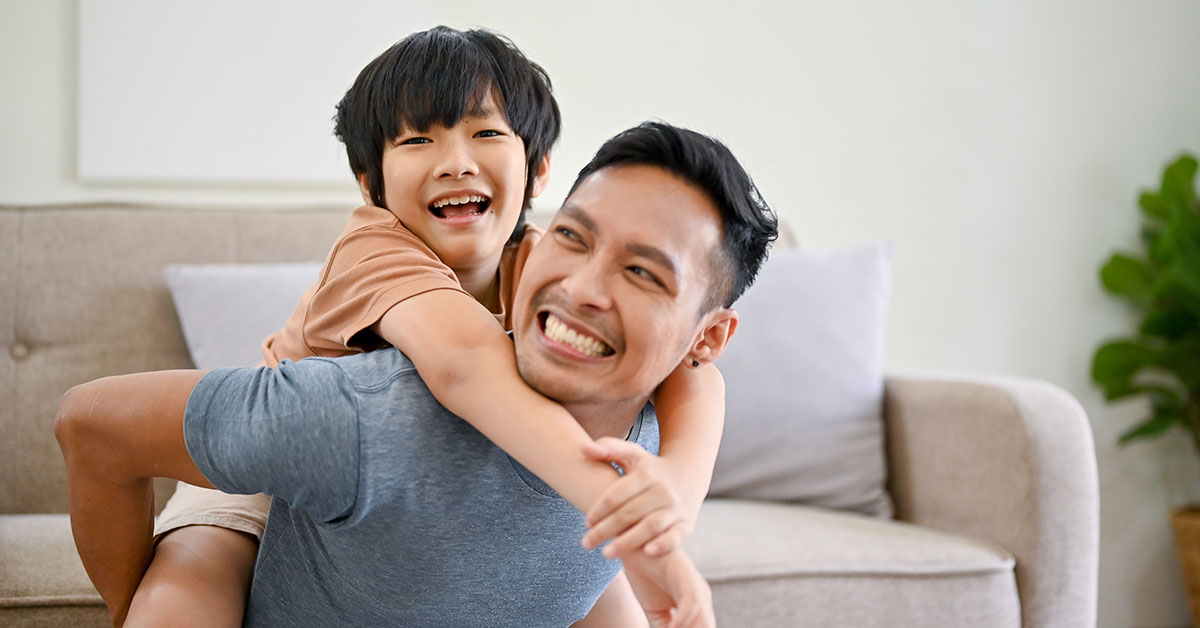 single father playing with son
