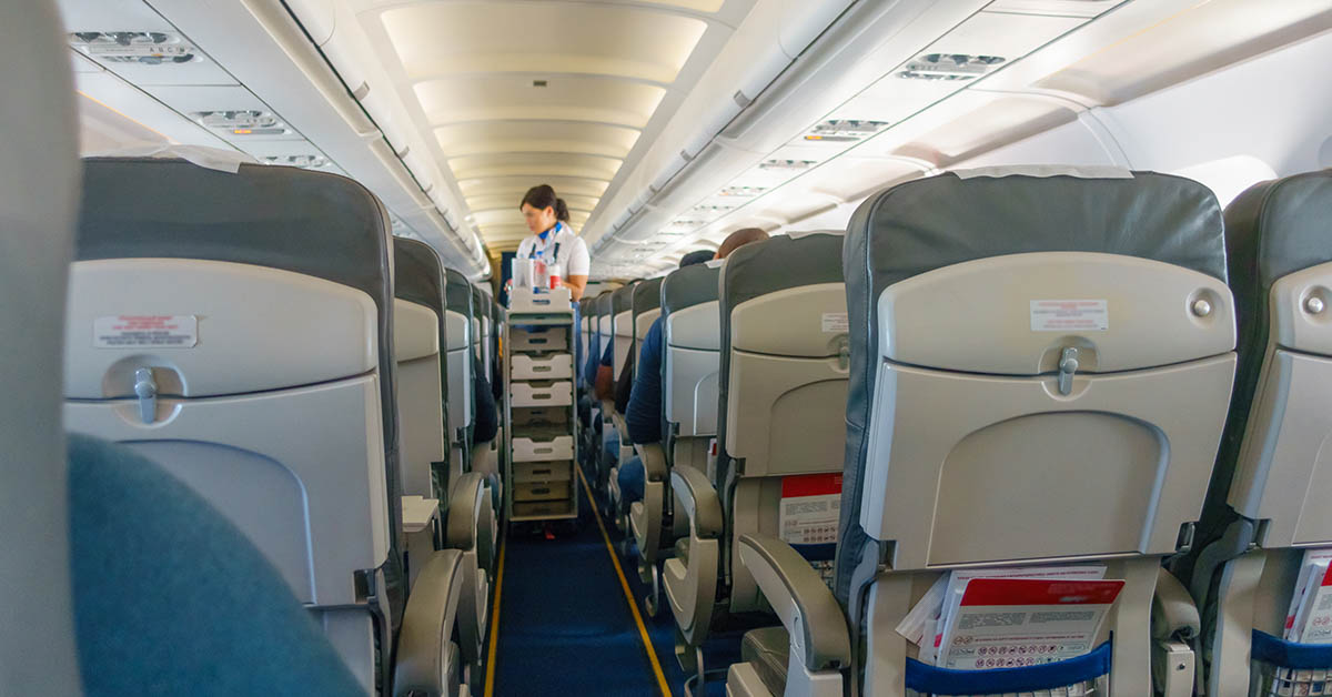 aisle inside passenger airplane