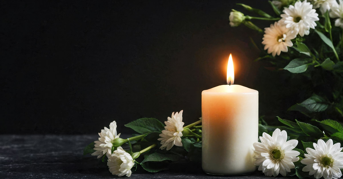 candle and white flowers