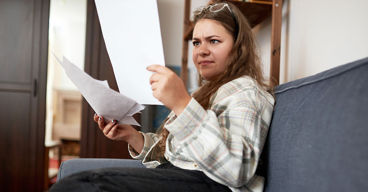 woman examining papers