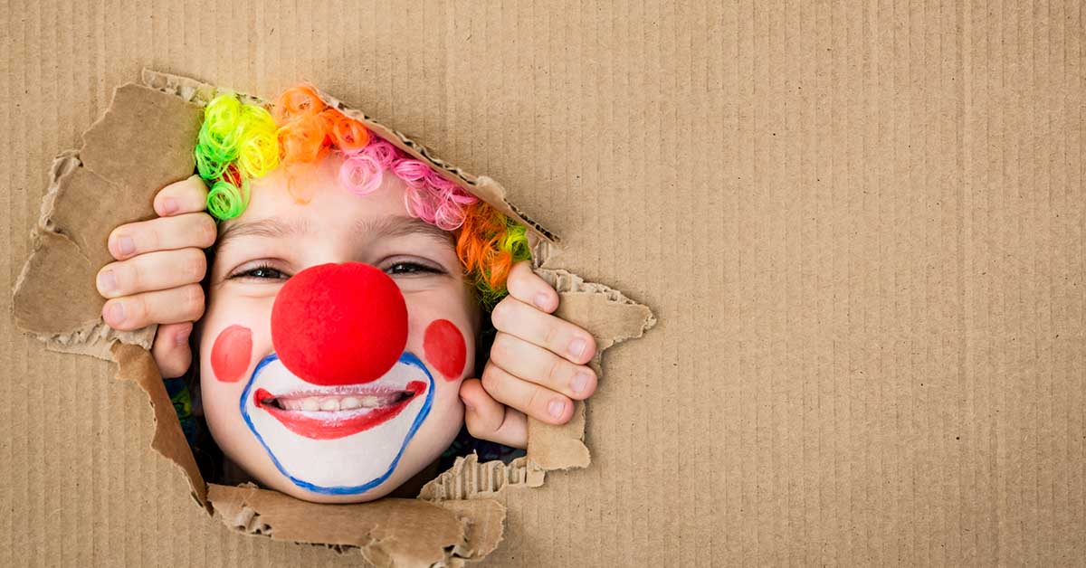 child dressed as a clown