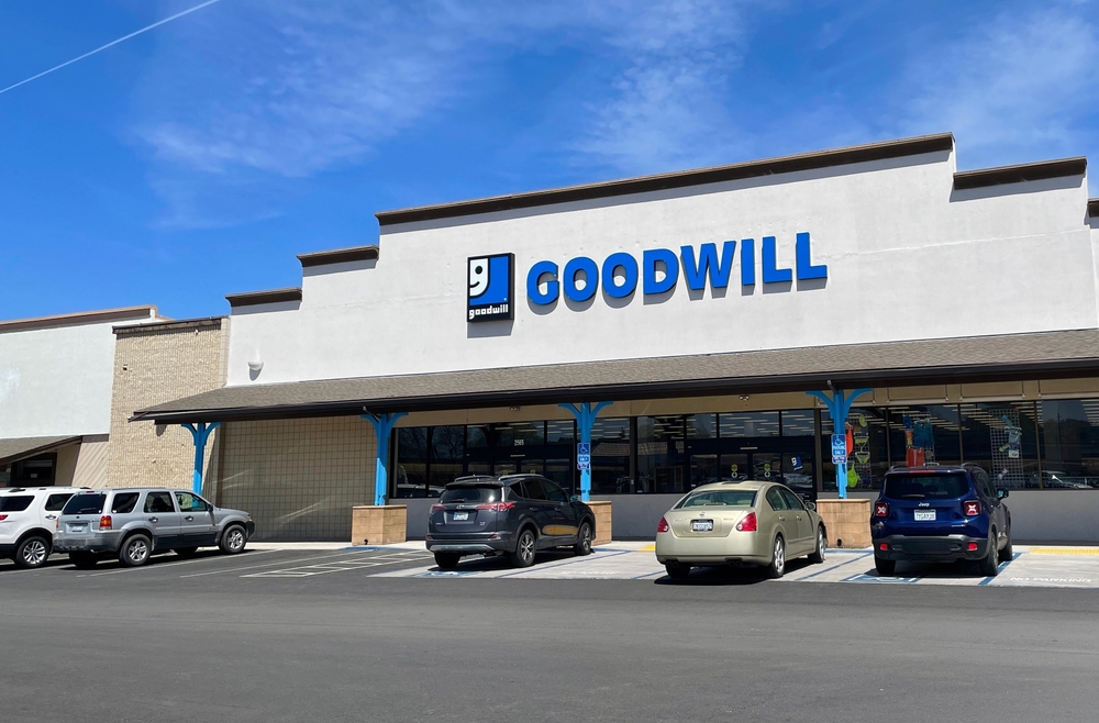 FRESNO, UNITED STATES - Jun 16, 2022: The Goodwill store from the parking lot on a sunny day under blue sky