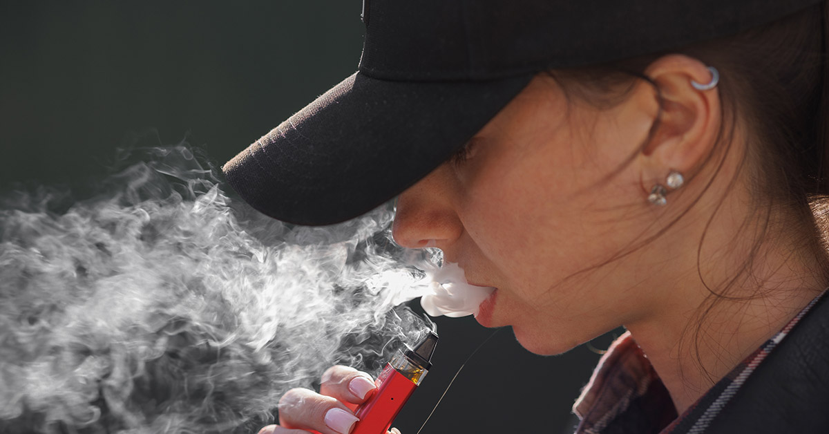 person smoking vape