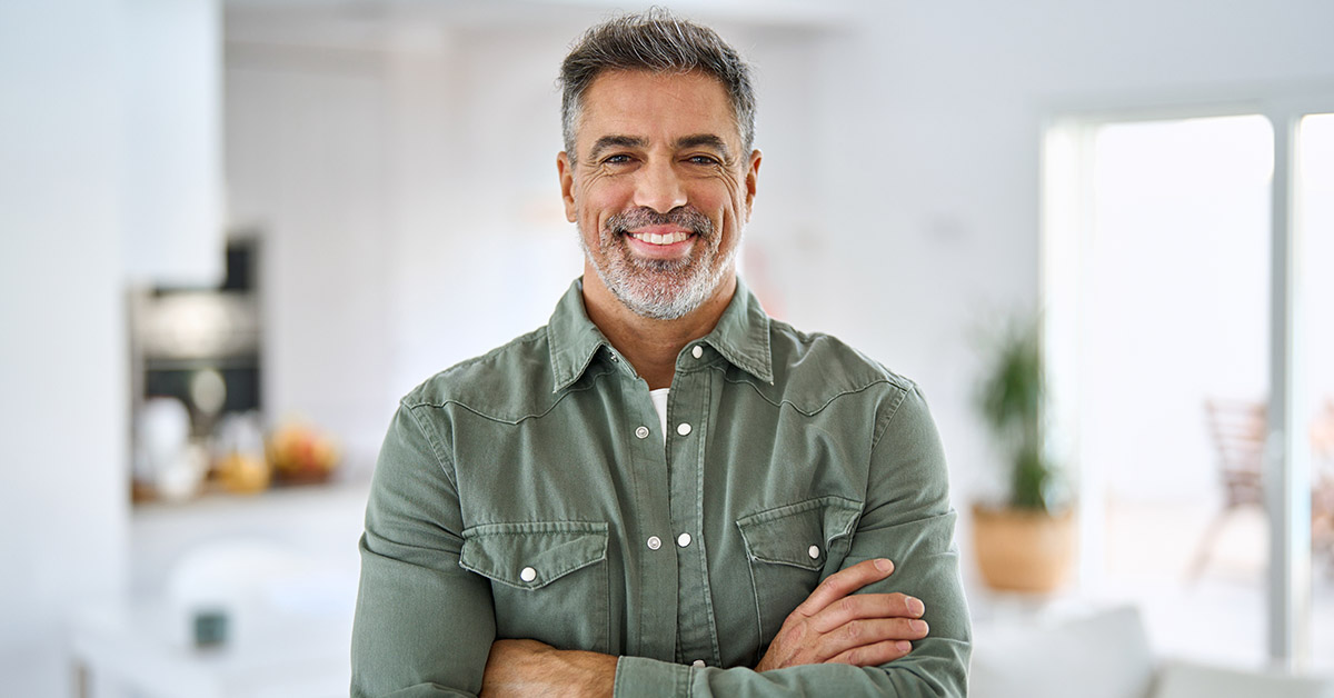 Confident man with arms crossed