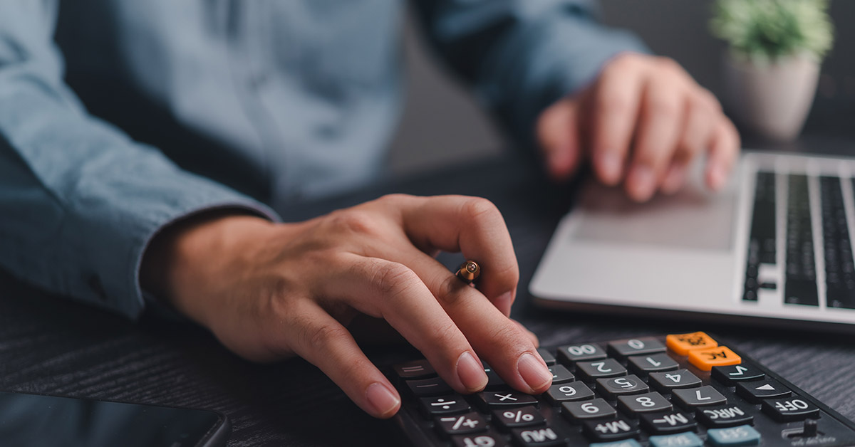 Man On Calculator