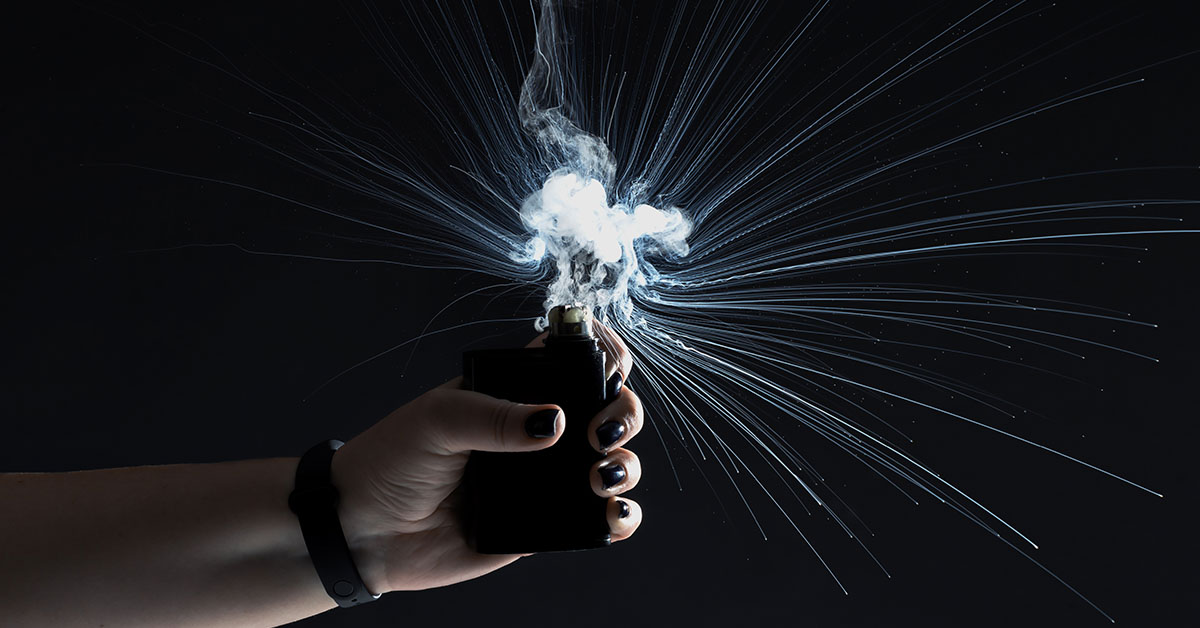 vape pen exploding in someones hand. Vape explosion concept