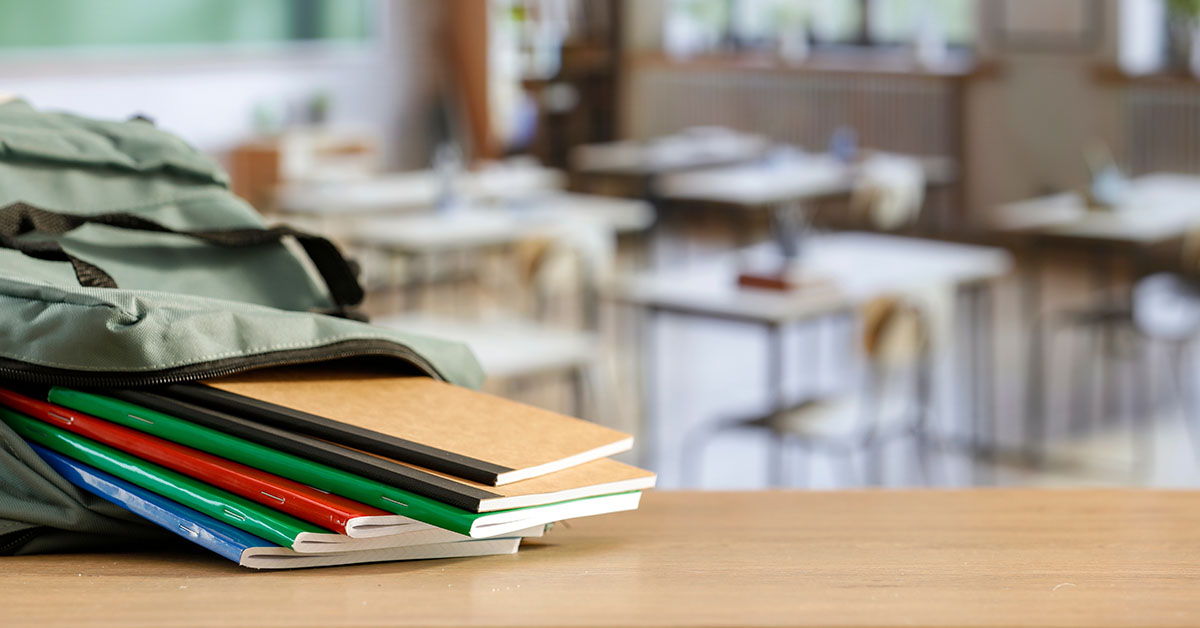 school bag with books in it