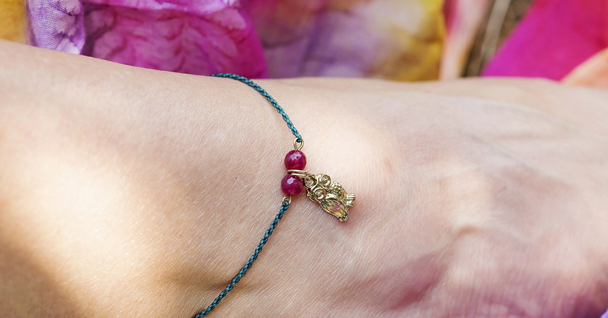 woman wearing ankle bracelet