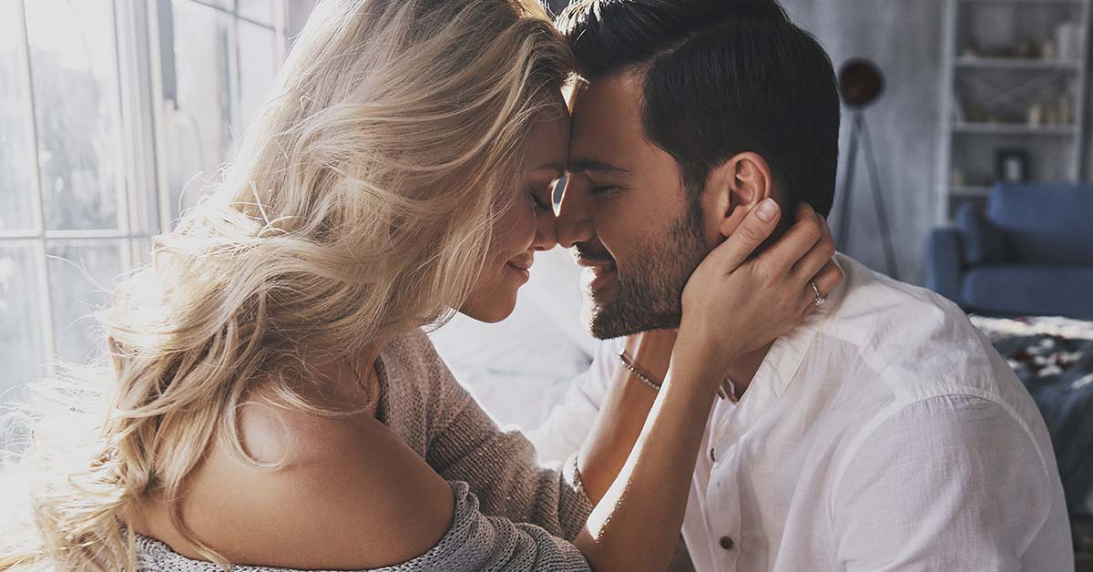 man and woman kissing, being intimate