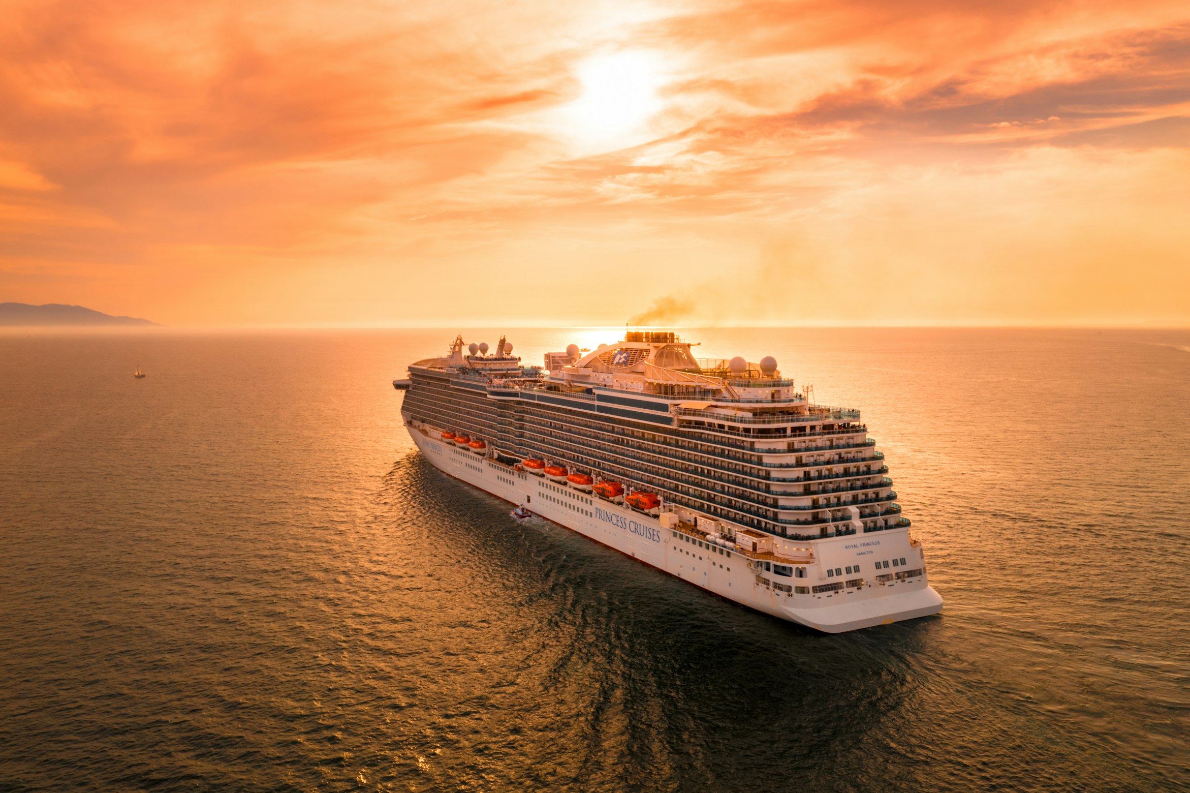 cruise ship at sunset