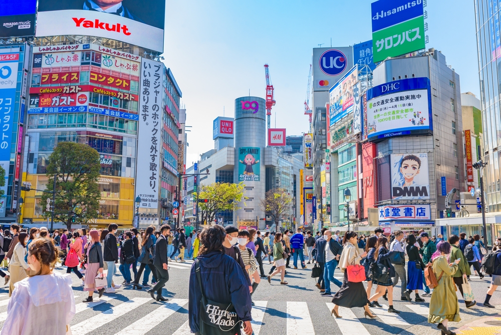 TOKYO, JAPAN - APR 8, 2022:  View of Shibuya Crossing, one of the busiest crosswalks in the world.